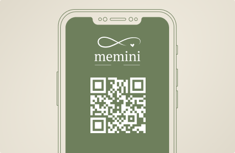 A phone showing a Memini QR code